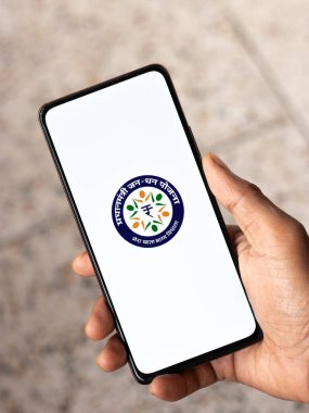 West Bangal, India - December 15, 2021 : Dhan logo on phone screen stock image.