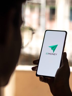 West Bangal, India - January 7, 2022 : ET Money logo on phone screen stock image.