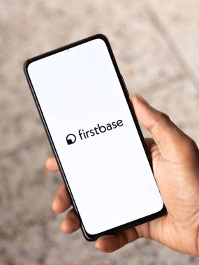 West Bangal, India - January 7, 2022 : Firstbase logo on phone screen stock image.