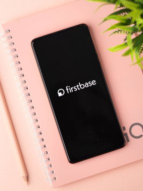 West Bangal, India - January 7, 2022 : Firstbase logo on phone screen stock image.