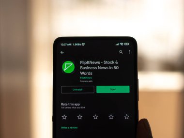 West Bangal, India - December 15, 2021 : Flipitnews logo on phone screen stock image.