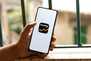 West Bangal, India - January 7, 2022 : Investing.com logo on phone screen stock image.