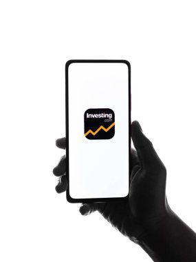 West Bangal, India - January 7, 2022 : Investing.com logo on phone screen stock image.