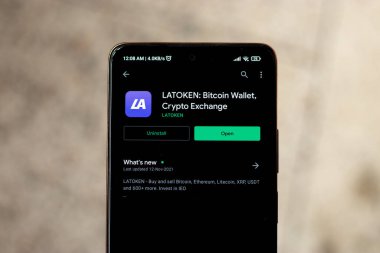 West Bangal, India - December 15, 2021 : LATOKEN logo on phone screen stock image.