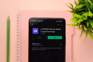 West Bangal, India - December 15, 2021 : LATOKEN logo on phone screen stock image.