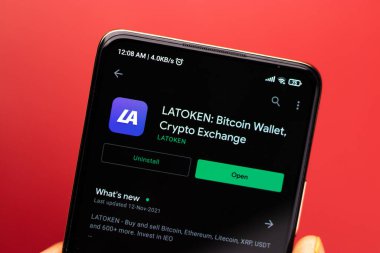 West Bangal, India - December 15, 2021 : LATOKEN logo on phone screen stock image.