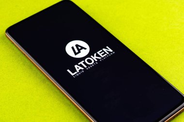 West Bangal, India - December 15, 2021 : LATOKEN logo on phone screen stock image.