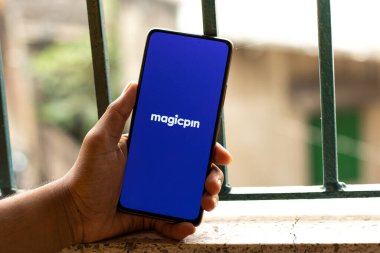 West Bangal, India - December 15, 2021 : Magicpin logo on phone screen stock image.