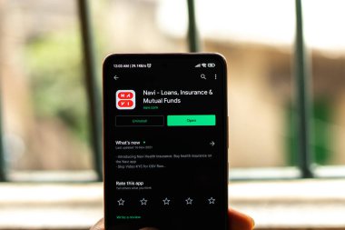 West Bangal, India - December 15, 2021 : Navi logo on phone screen stock image.