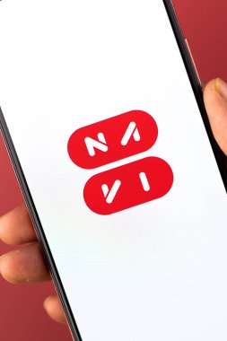 West Bangal, India - December 15, 2021 : Navi logo on phone screen stock image.