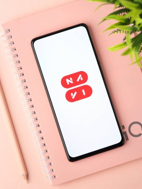 West Bangal, India - December 15, 2021 : Navi logo on phone screen stock image.