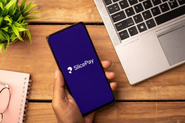 West Bangal, India - January 7, 2022 : Slice card logo on phone screen stock image.