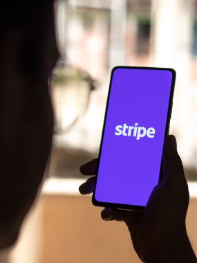 West Bangal, India - January 7, 2022 : Stripe logo on phone screen stock image.