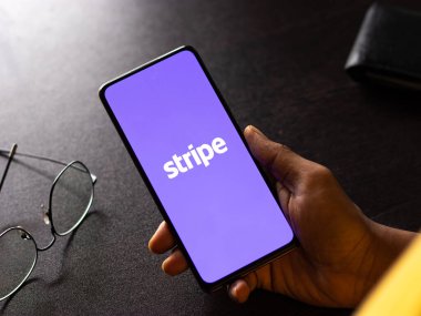 West Bangal, India - January 7, 2022 : Stripe logo on phone screen stock image.