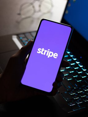 West Bangal, India - January 7, 2022 : Stripe logo on phone screen stock image.