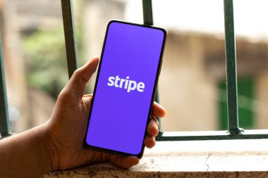 West Bangal, India - January 7, 2022 : Stripe logo on phone screen stock image.