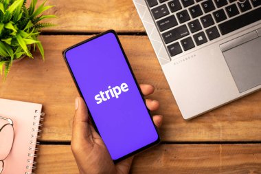 West Bangal, India - January 7, 2022 : Stripe logo on phone screen stock image.