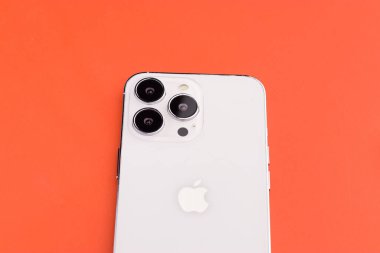 West Bangal, India - January 10, 2022 : Apple iphone 13 pro in frame with colorful background.