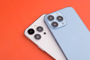 West Bangal, India - January 10, 2022 : Apple iphone 13 pro in frame with colorful background.