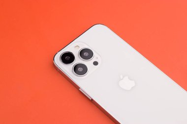 West Bangal, India - January 10, 2022 : Apple iphone 13 pro in frame with colorful background.
