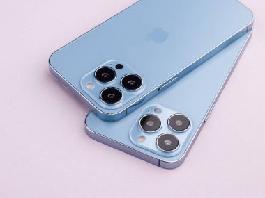 West Bangal, India - January 10, 2022 : Apple iphone 13 pro in frame with colorful background.