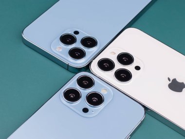 West Bangal, India - January 10, 2022 : Apple iphone 13 pro in frame with colorful background.