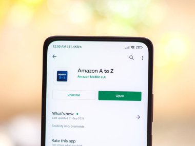 West Bangal, India - December 05, 2021 : Amazon A to Z logo on phone screen stock image.