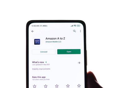 West Bangal, India - December 05, 2021 : Amazon A to Z logo on phone screen stock image.