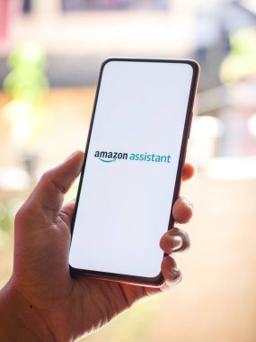 West Bangal, India - December 05, 2021 : Amazon assistant logo on phone screen stock image.