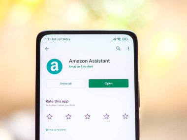 West Bangal, India - December 05, 2021 : Amazon assistant logo on phone screen stock image.
