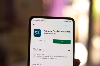 West Bangal, India - December 05, 2021 : Amazon business logo on phone screen stock image.