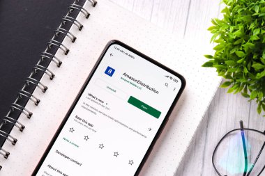 West Bangal, India - December 05, 2021 : Amazon distributor logo on phone screen stock image.