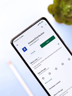 West Bangal, India - December 05, 2021 : Amazon distributor logo on phone screen stock image.