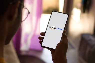 West Bangal, India - December 05, 2021 : Amazon Drive logo on phone screen stock image.