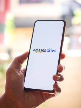 West Bangal, India - December 05, 2021 : Amazon Drive logo on phone screen stock image.