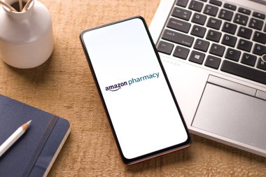 West Bangal, India - December 05, 2021 : Amazon Pharmacy logo on phone screen stock image.