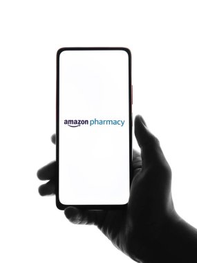 West Bangal, India - December 05, 2021 : Amazon Pharmacy logo on phone screen stock image.