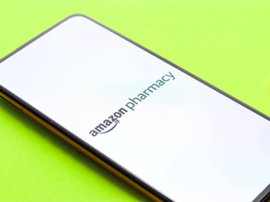 West Bangal, India - December 05, 2021 : Amazon Pharmacy logo on phone screen stock image.