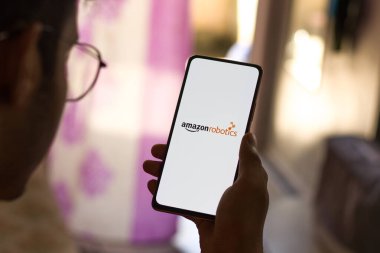 West Bangal, India - December 05, 2021 : Amazon Robotics logo on phone screen stock image.