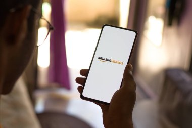 West Bangal, India - December 05, 2021 : Amazon Studios logo on phone screen stock image.