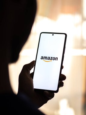 West Bangal, India - December 05, 2021 : Amazon logo on phone screen stock image.