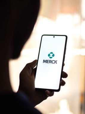 West Bangal, India - April 20, 2022 : Merck logo on phone screen stock image.