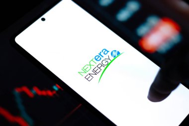 West Bangal, India - April 20, 2022 : NextEra Energy logo on phone screen stock image.