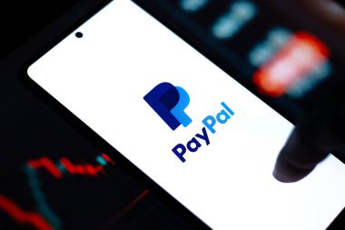 West Bangal, India - April 20, 2022 : PayPal logo on phone screen stock image.