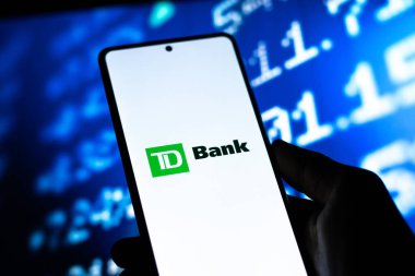 West Bangal, India - April 20, 2022 : TD Bank on phone screen stock image.