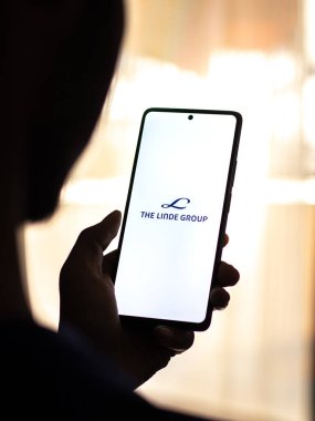 West Bangal, India - April 20, 2022 : Linde Group on phone screen stock image.