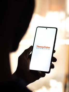 West Bangal, India - April 20, 2022 : Thermo Fisher Scientific on phone screen stock image.