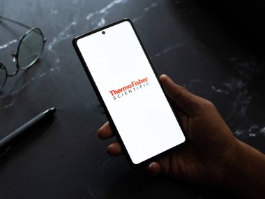 West Bangal, India - April 20, 2022 : Thermo Fisher Scientific on phone screen stock image.