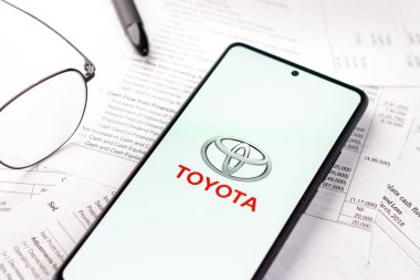 West Bangal, India - April 20, 2022 : Toyota on phone screen stock image.