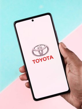 West Bangal, India - April 20, 2022 : Toyota on phone screen stock image.